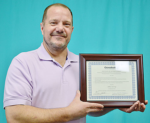 Jeffery with award