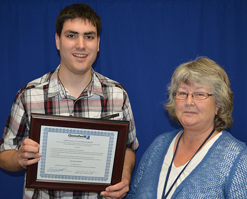 Joe with award