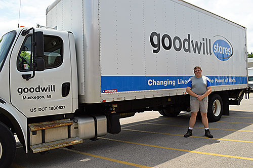 Jon in front of Goodwill truck